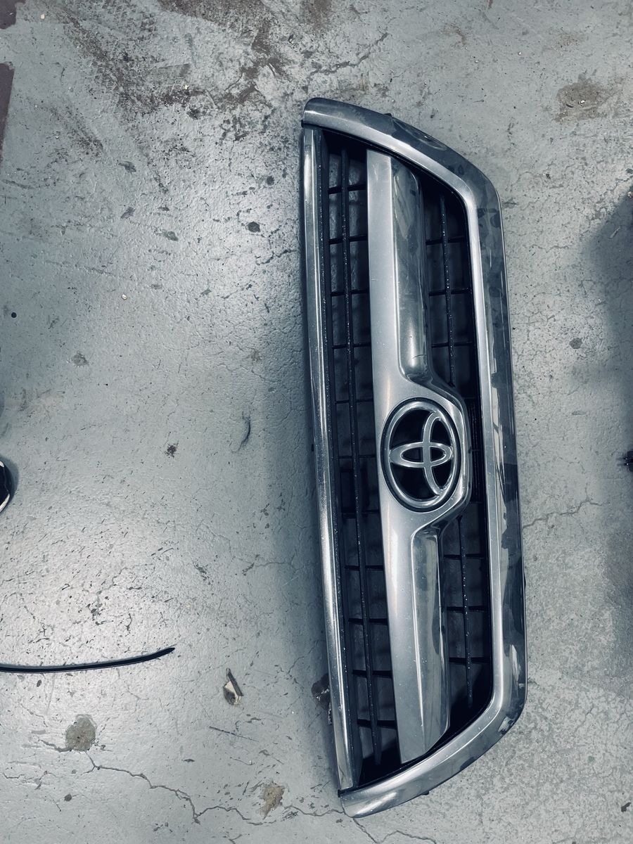 Toyota OEM Front Grille with Chrome Trim and Emblem
