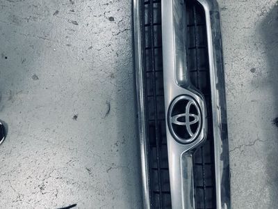 Toyota OEM Front Grille with Chrome Trim and Emblem