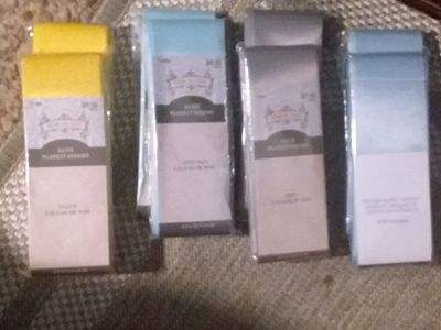 8 PACKAGES OF BLANKET BINDING.... 4 COLORS
