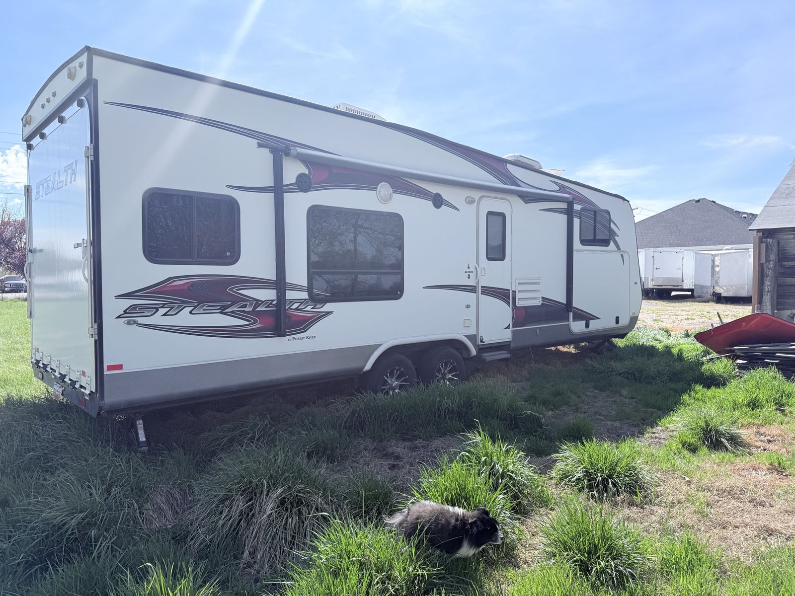 2014 Forest River Stealth 30 ft Toy Hauler - Sleeps 6-8, Dual Axle, Off-Grid Ready with Solar