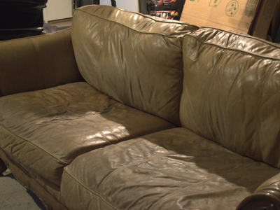 Ashley Ornate Wood Couch and Chair in Beige Leather