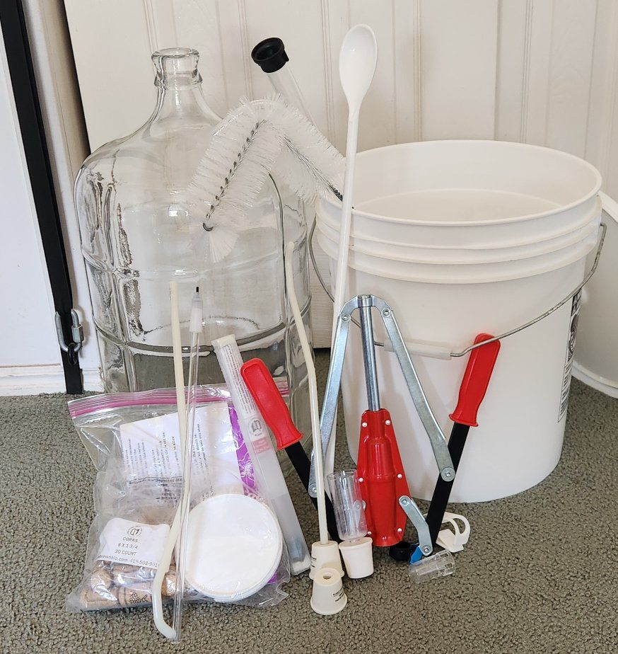 Complete Home Winemaking Starter Kit with Glass Carboy, Fermenting Bucket, Hand Corker, and Wine Bottles