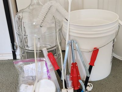 Complete Home Winemaking Starter Kit with Glass Carboy, Fermenting Bucket, Hand Corker, and Wine Bottles
