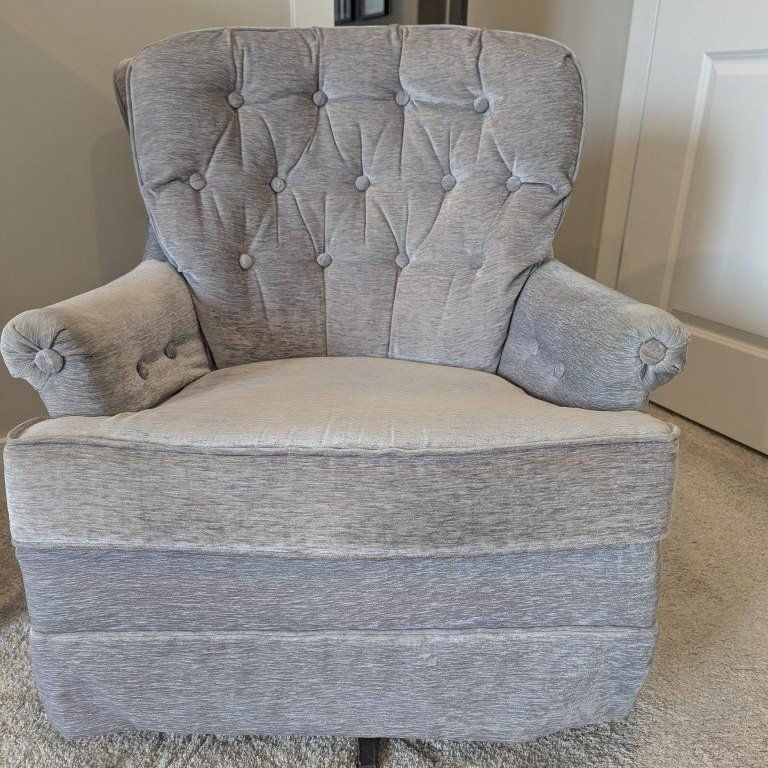 Grey velvet swivel rocker