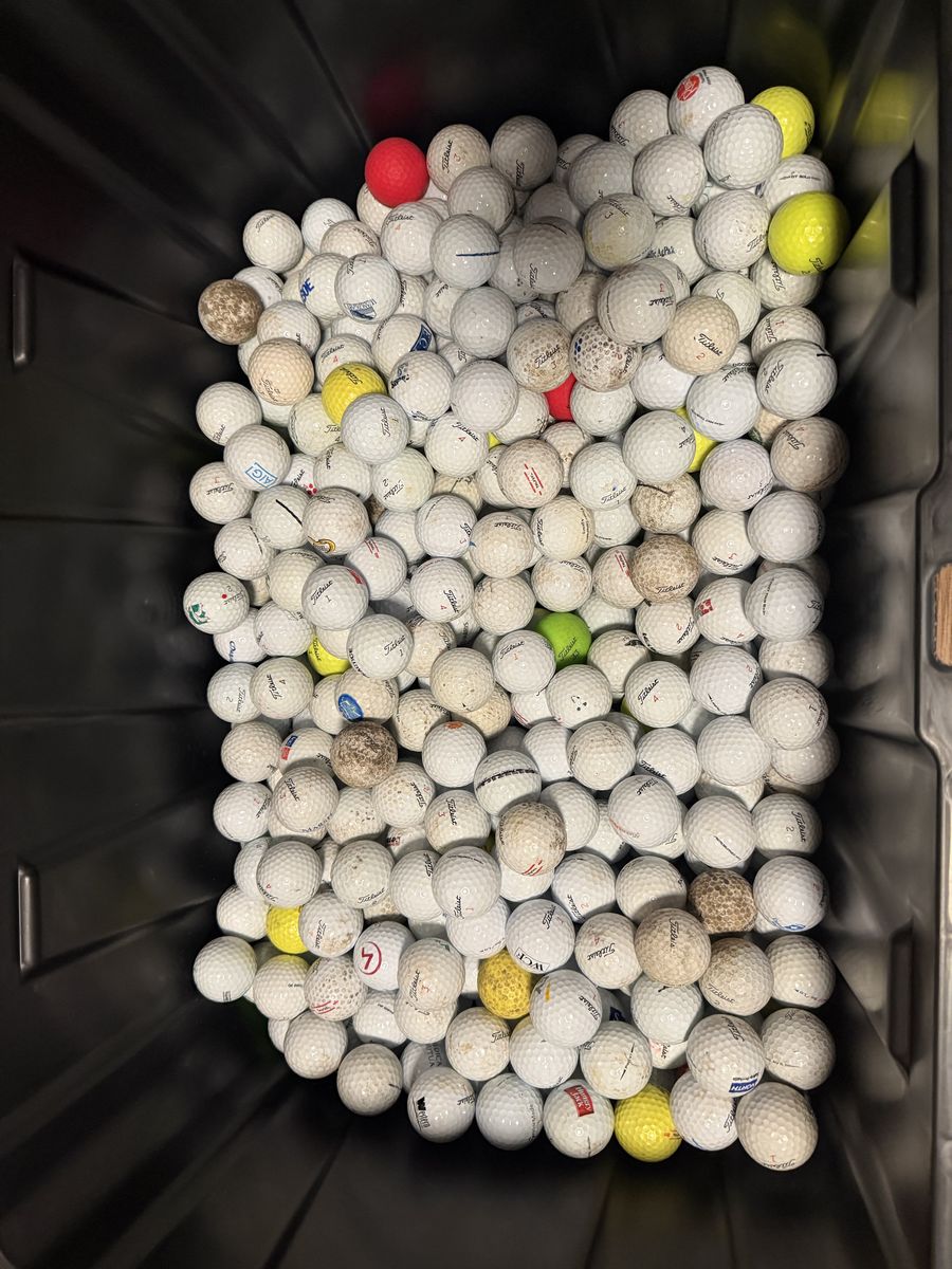 800 ish Titleist golf balls.