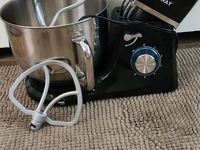 black Costway Stand Mixer featuring a stainless steel mixing bowl and interchangeable attachments