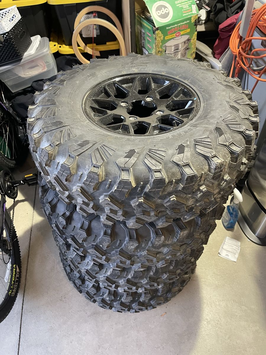 Set of four Can Am X3 tires and rims new pull from brand new side by side