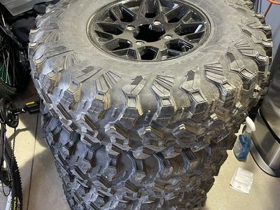 Set of four Can Am X3 tires and rims new pull from brand new side by side