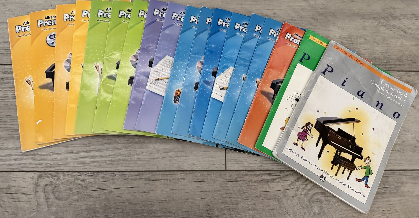 Set of 19 Alfred's Basic Piano Books + 6 Regular Piano Books