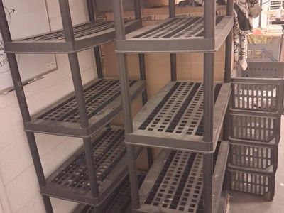 Two 6' tall plastic storage shelves