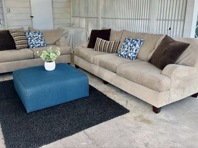 Couches, ottoman, pillows