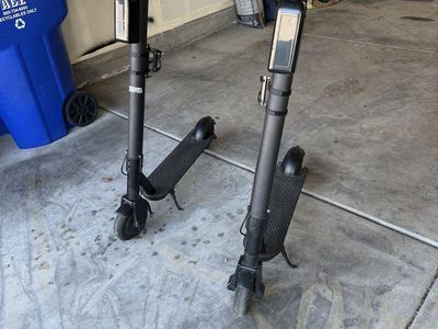 2 Segway electric scooters