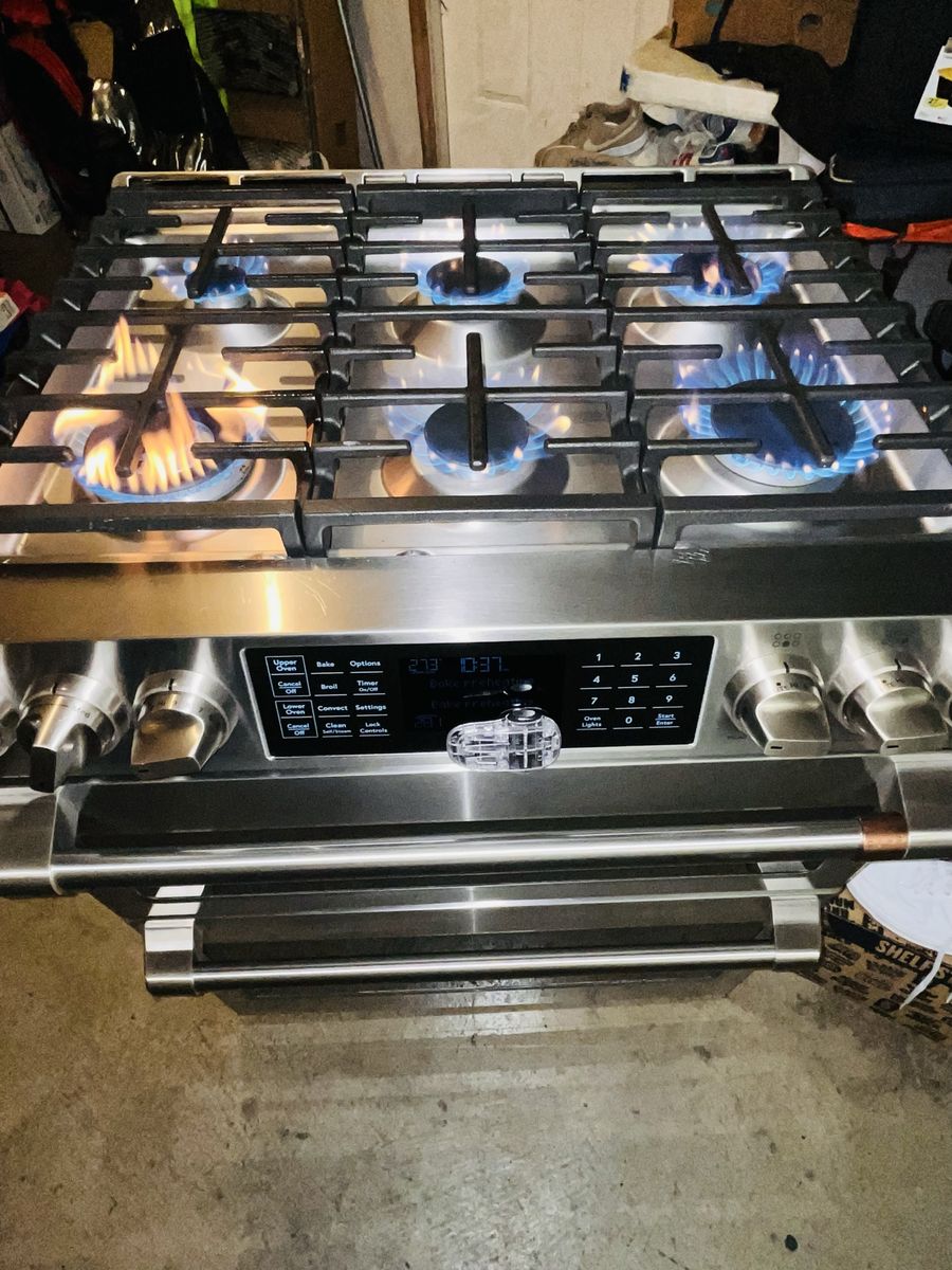 $650 OBO GOOD SLIDE GAS RANGE GE CAFE STAINLESS