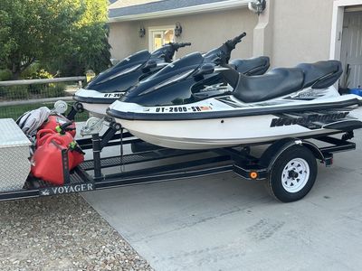 Pair of Yamaha WaveRunner GP1300R Jet Skis with Voyager Trailer with storage and lockable gas cans.