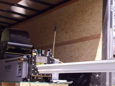 Enclosed Trailer, Siding Brake, and mounted Gutter Bending Machine.