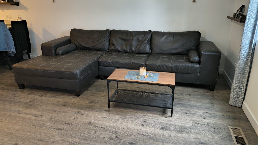 Black Faux Leather Sectional Sofa with Left-Facing Chaise - UsedGood Condition