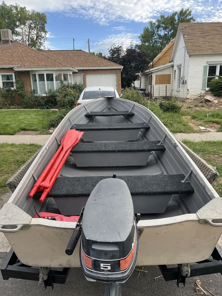 14 Ft Aluminum Boat with 5 HP Mariner Motor and Trailer