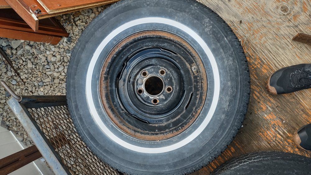 1966 Cadillac wheels and hubcaps