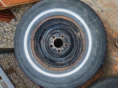 1966 Cadillac wheels and hubcaps