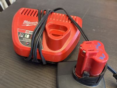 Milwaukee M12 Cordless Lithium-Ion Battery Charger & M12 REDLITHIUM XC 3.0 Battery