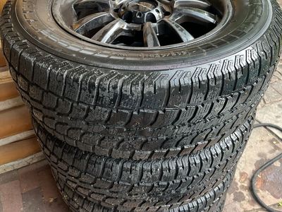 Winter tires. Set of 4 Black Rims with 265/65R18 Tires