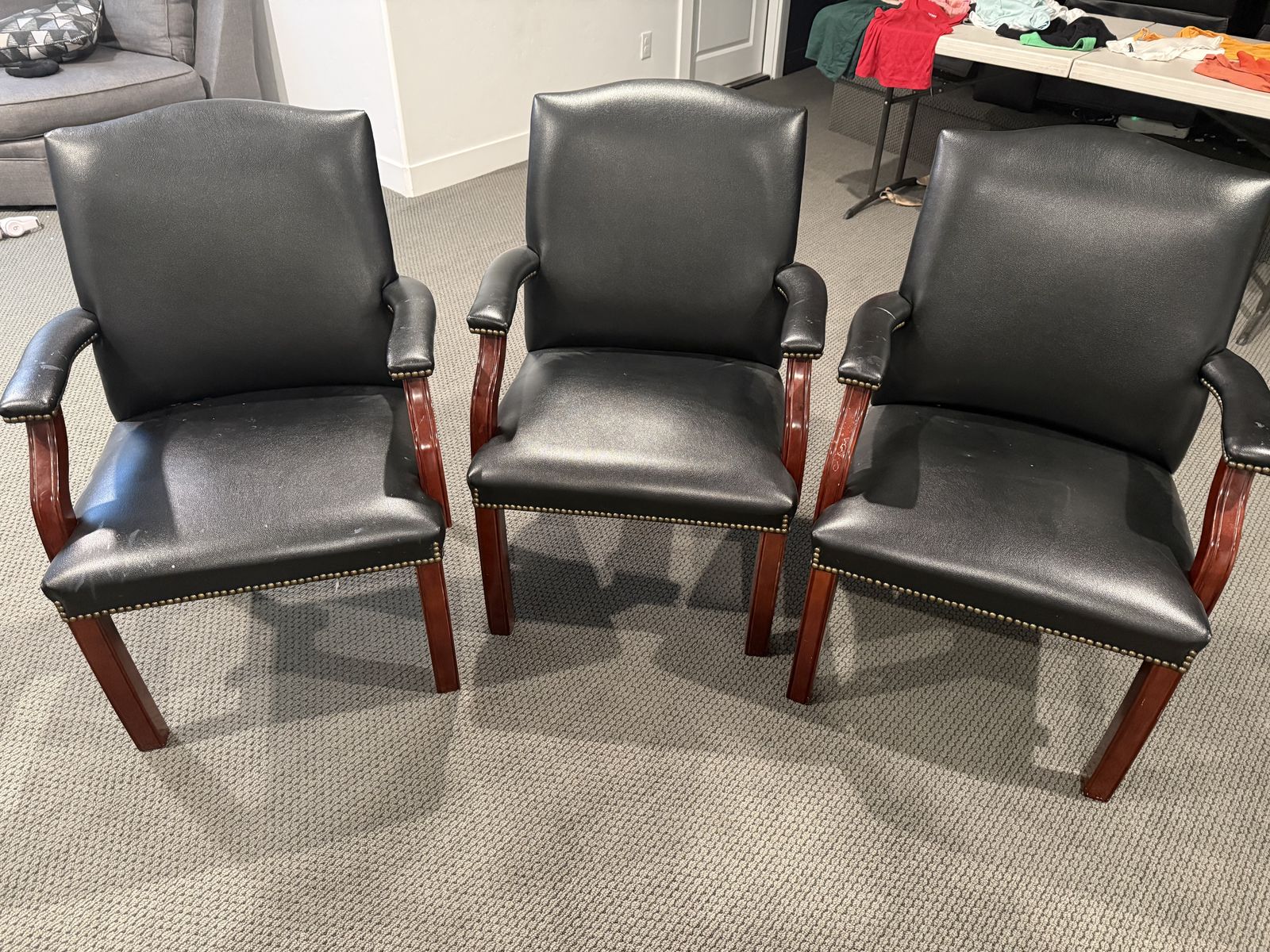 Circle Table and Black Leather Chairs