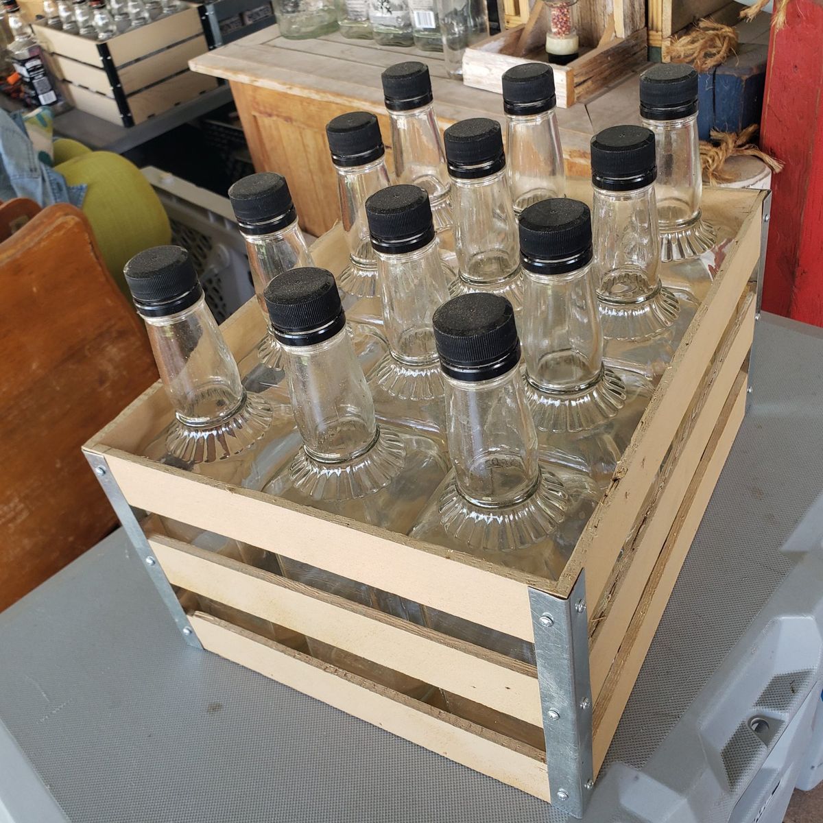 hand crafted create with whiskey bottles