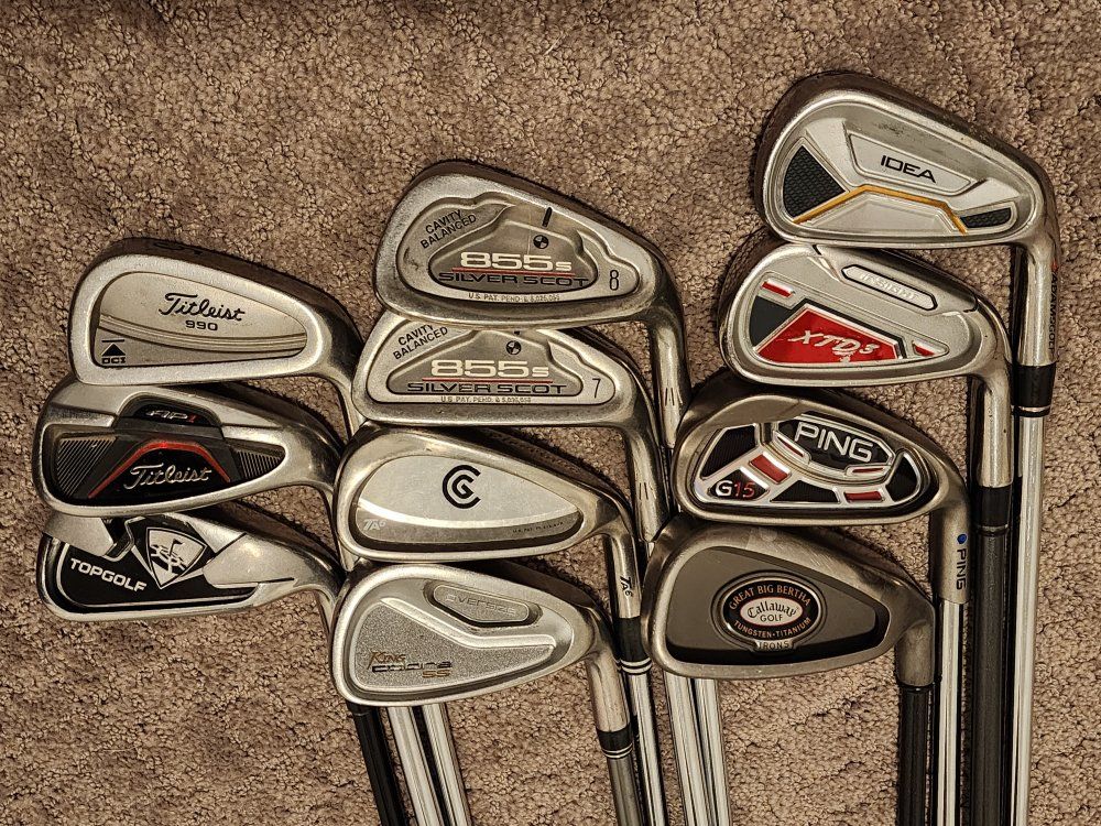 Random golf clubs. Ping, Titleist, Callaway irons