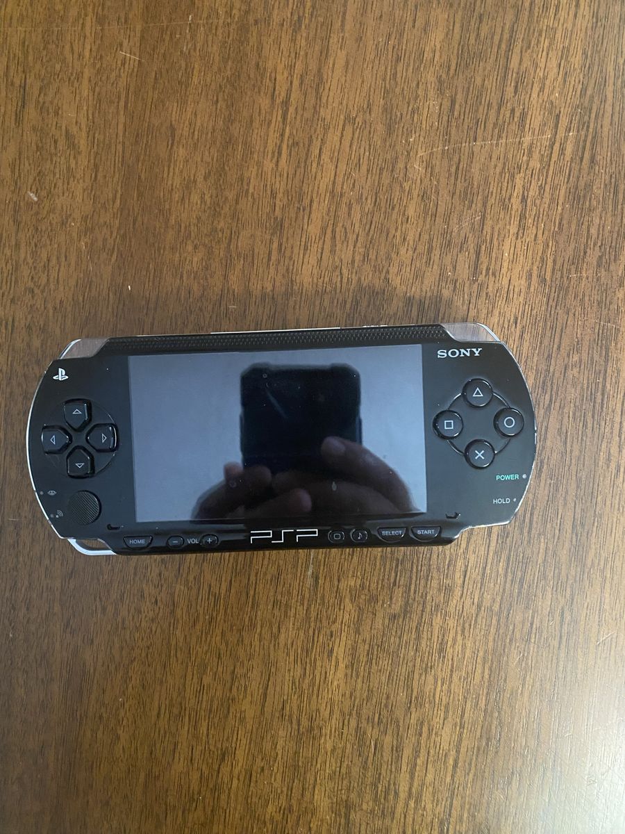 Sony PSP 1001 with 13 games and 7 movies, make offer