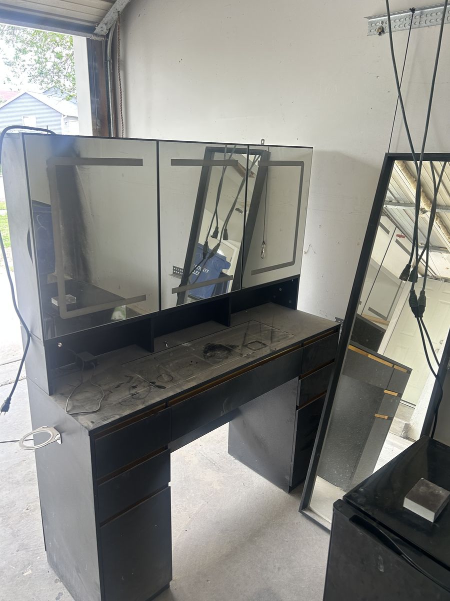 Vanity with lights and side cubicles