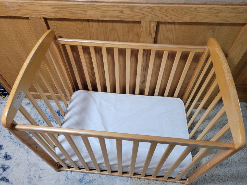 Wooden Baby Crib and Fisher-Price Infant Rocker
