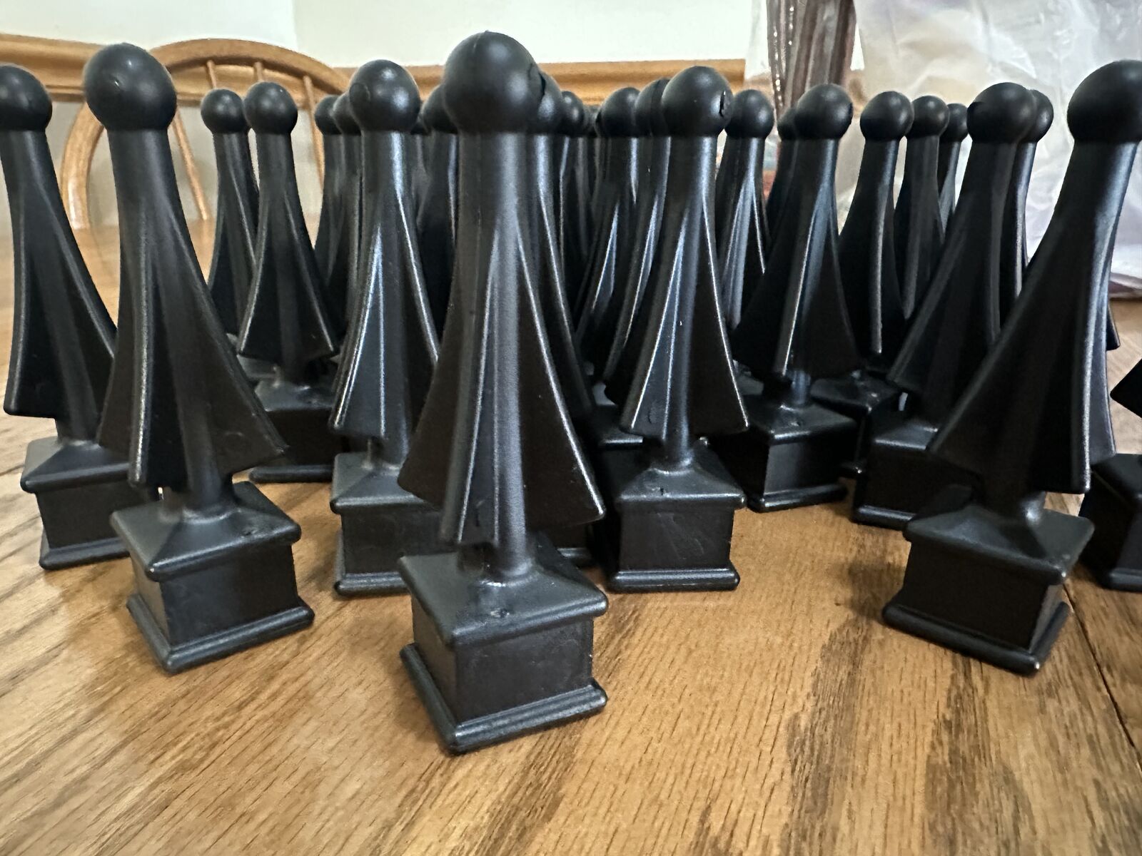 Four-sided black 5/8" spire wing tip finial fence toppers for iron pickets. (QTY-50)