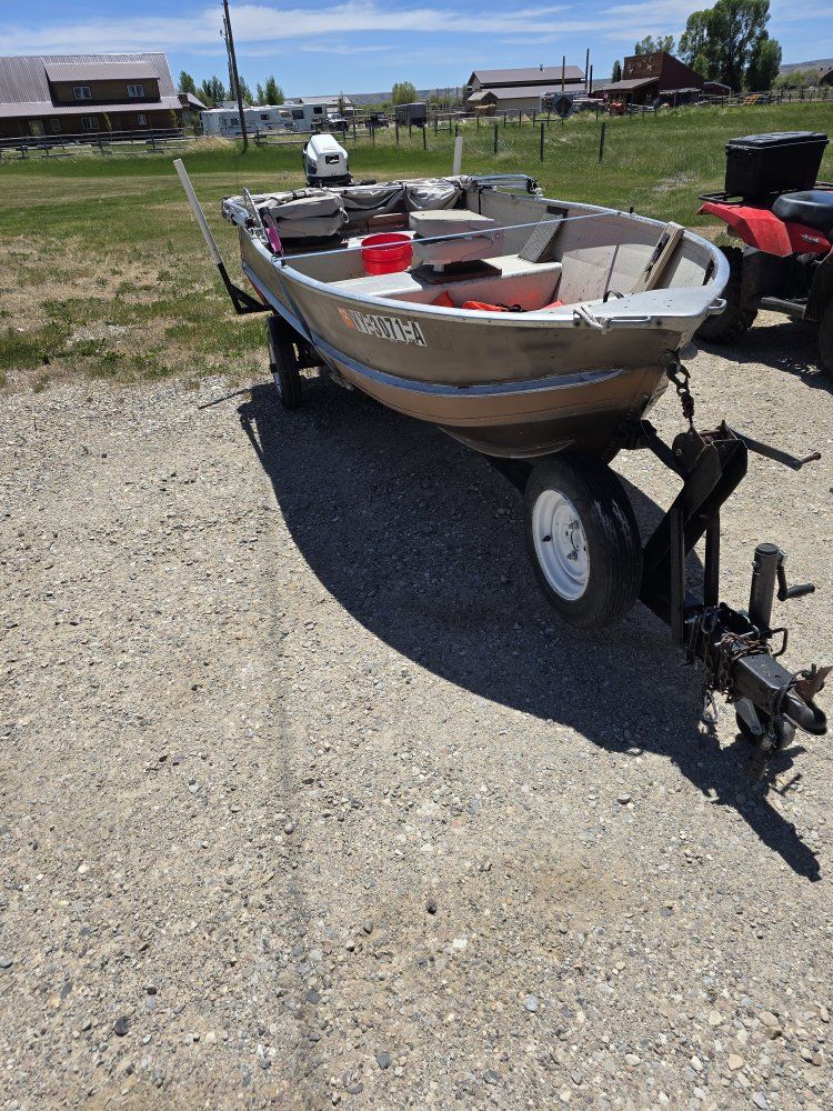 Used Nymph Fishing Boat with 10hp Honda Outboard & Trailer