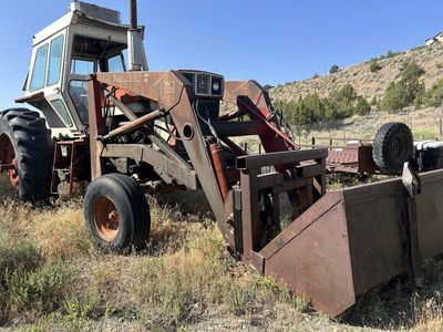International Harvester 966 Hydro Tractor with Westendorf Front Loader Bucket and Forks