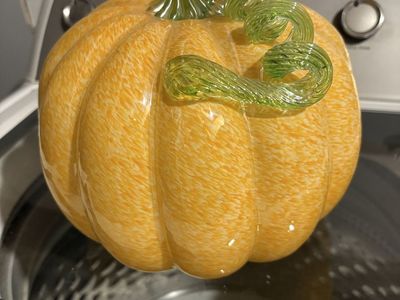 Several glass pumpkins