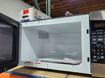 Nice GE Stainless Steel Counter Top Microwave! Low Price Guaranteed