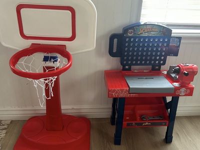 Kids, basketball hoop and tool bench