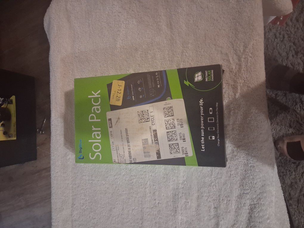 Big blue , twenty eight watt , portable solar pane