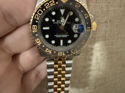 Rolex GMT-Master II 126713GRNR Two-Tone Yellow Gold & Steel Black Dial Jubilee Bracelet