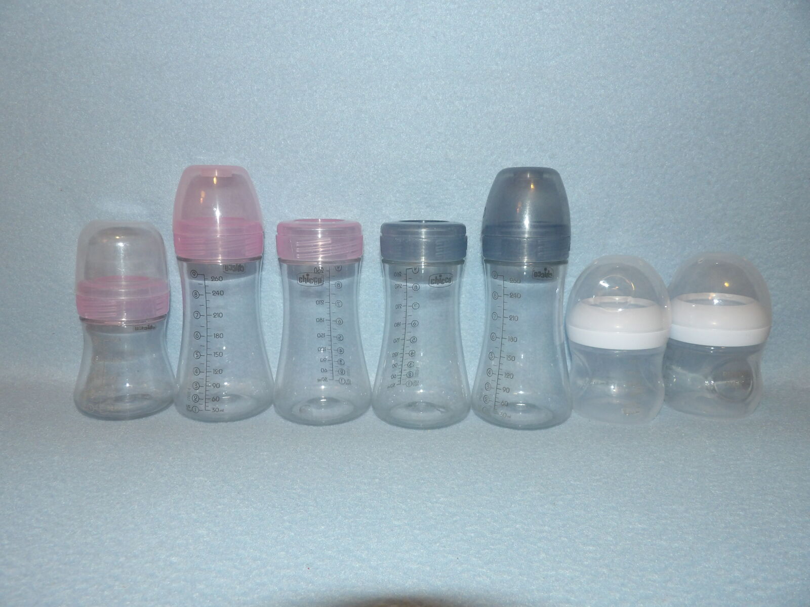 Lot of 7 - Five Chicco (four 8 oz + one 4 oz) & Two (4 oz) Philips Avent Baby Plastic Bottles - No nipples