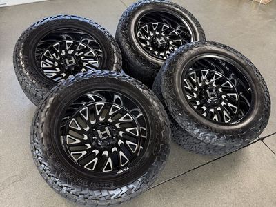 BRAND NEW 22x12 hostile wheels/ 37x13.50r22 nitto recons 8x170