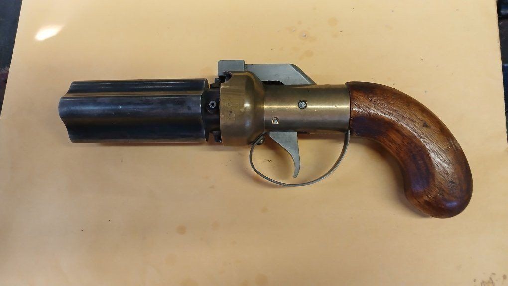 antique style muzzleloading pepper box  pistol asking 200.00 obo.