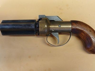 antique style muzzleloading pepper box pistol asking 200.00 obo.