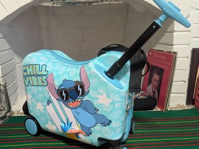 Disney Stitch Ride-On Carry-on Rolling Suitcase
