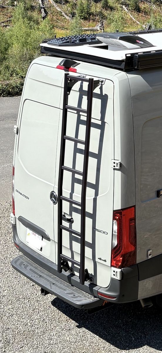 Black Adjustable Rear Door Ladder off Sprinter High Roof