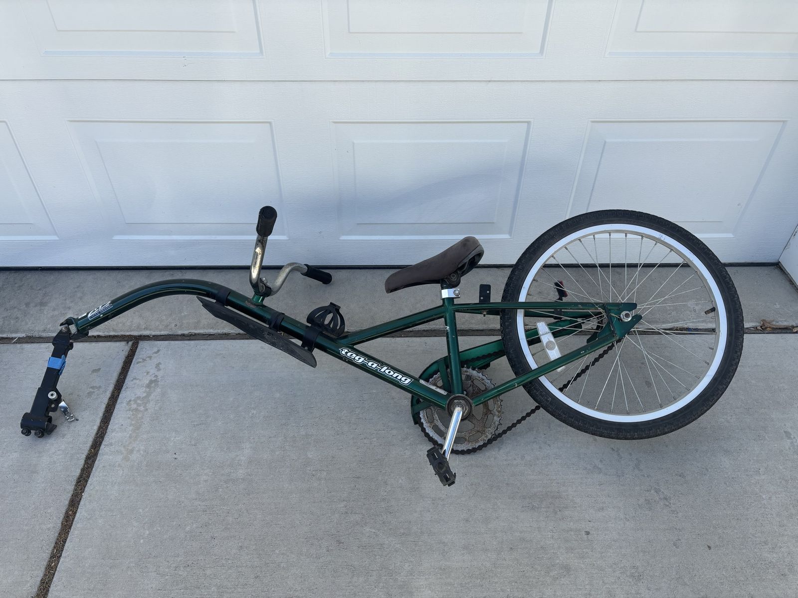 Tag along bike attachment