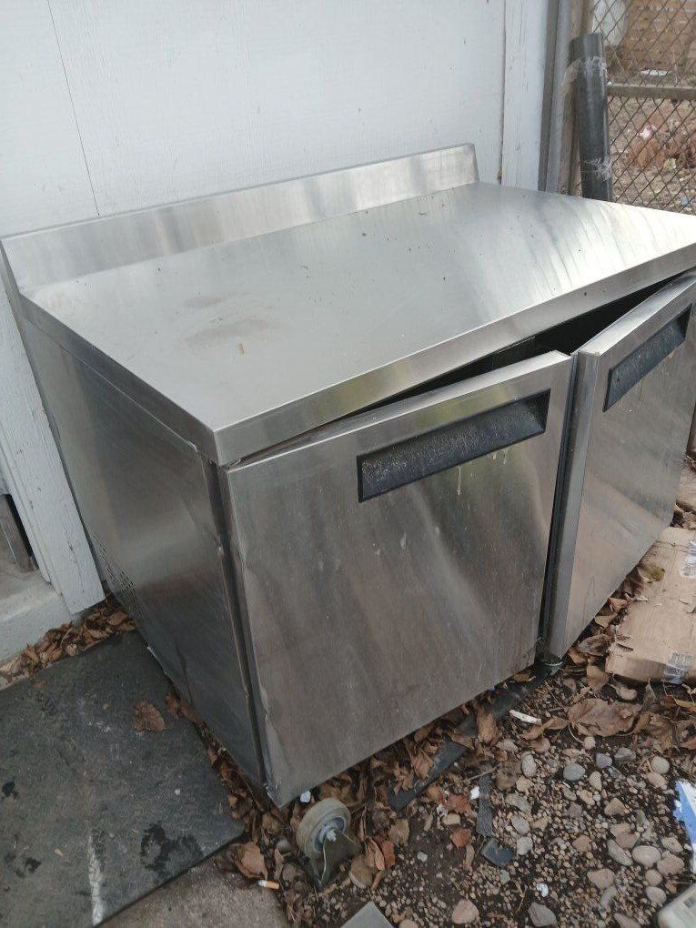 Old freezer turned workbench w/storeage