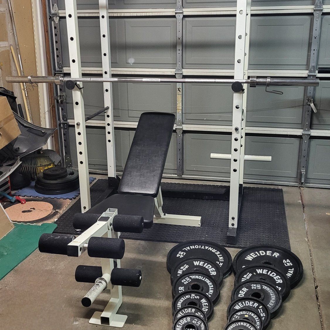 Bench and 244 pounds of weights