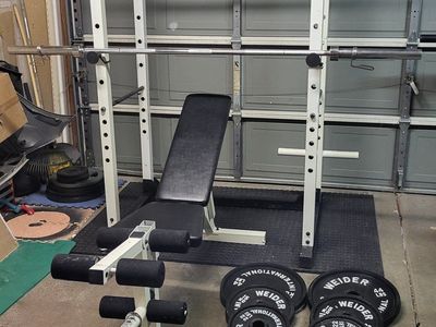 Bench and 244 pounds of weights