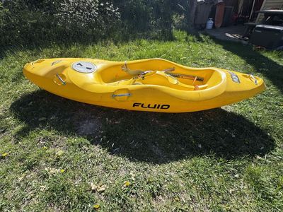 Fluid whitewater sit-on-top kayak